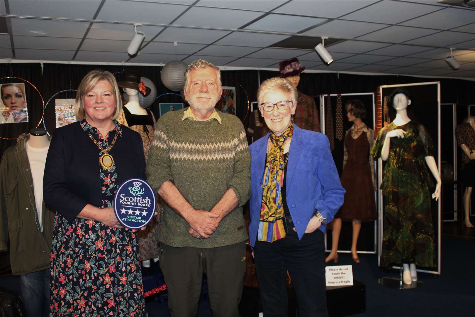 Provost Judy Whyte, guest speaker heritage conservationist James Mitchell and Joan Bruce at the Fashion through the ages exhibition, Garioch Heritage centre at the society meeting this weekPicture: Griselda McGregor