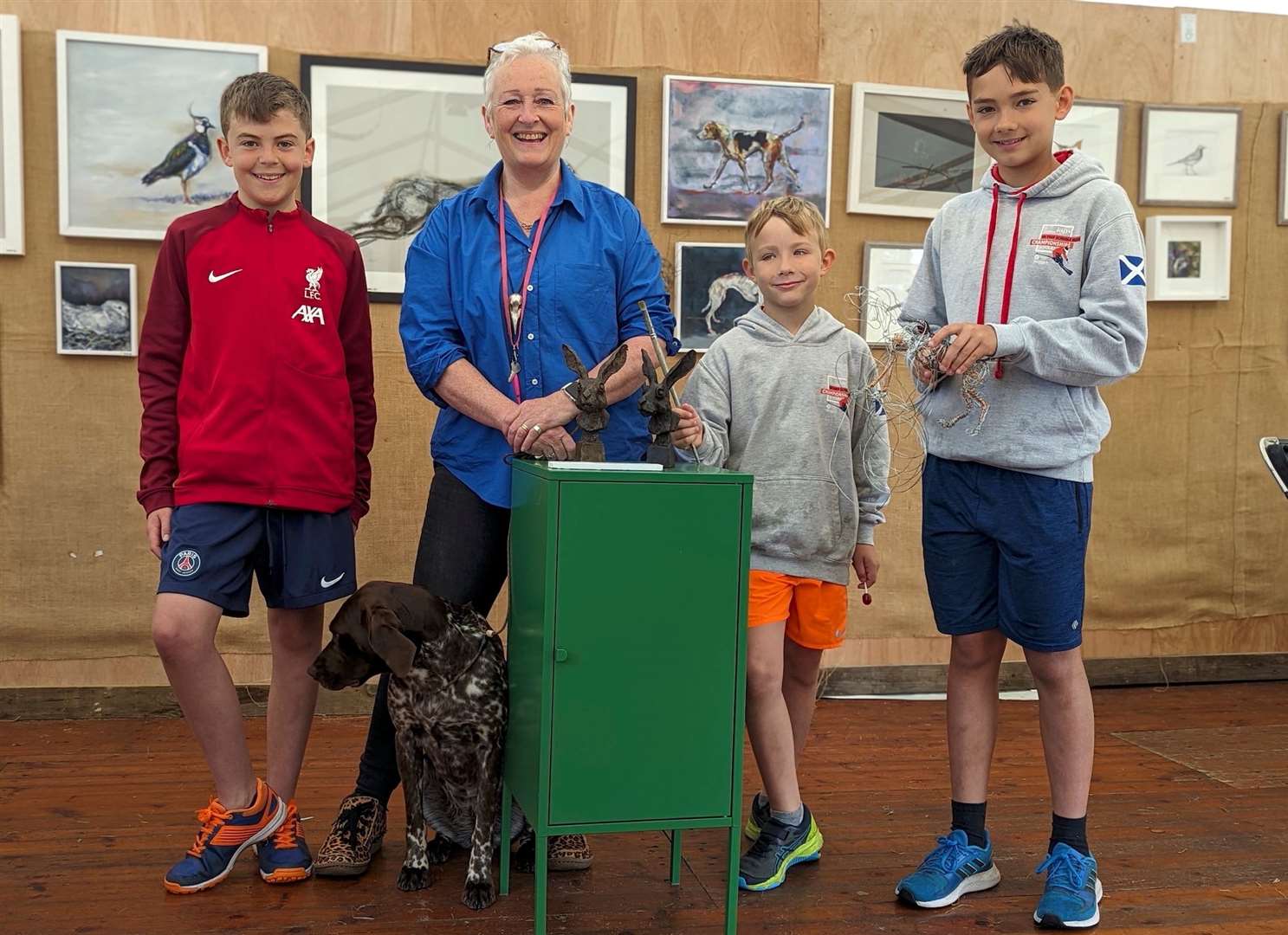 GWCT welcomed artist Mel Shand pictured with (lett) Hugo Brown, Charlie Laing and William Laing to launch this years competition.
