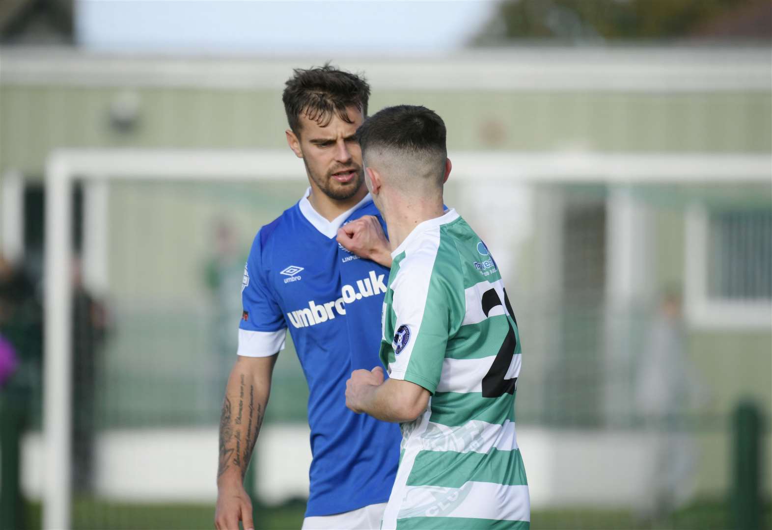 Buckie Thistle's Marcus Goodall and Linfield's Matthew Clarke in discussion after Buckie's opener. Picture: Beth Taylor